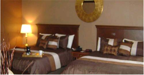 Imagen de la habitación del Hotel Talbot Trail Inn and Suites. Foto 4