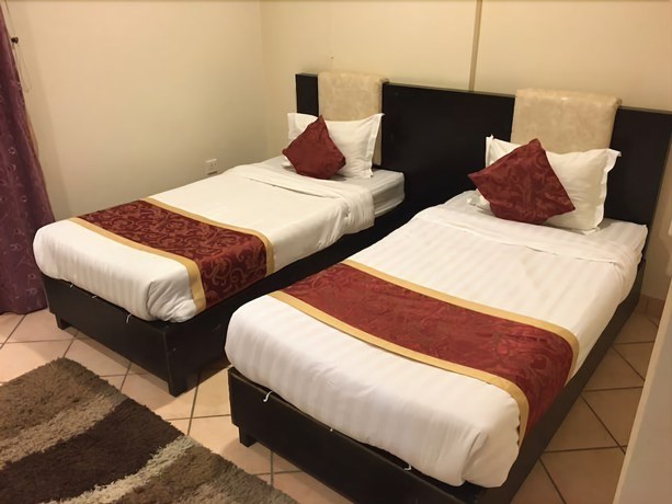 Imagen de la habitación del Hotel Taleen Almalaz Apartments. Foto 4