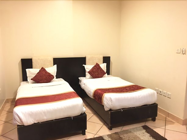Imagen de la habitación del Hotel Taleen Almalaz Apartments. Foto 10