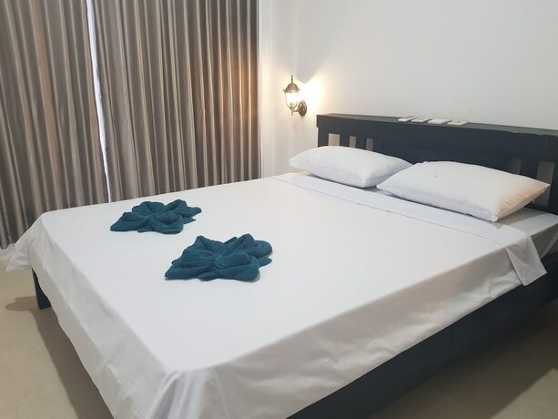 Imagen de la habitación del Hotel Talent Resort. Foto 17