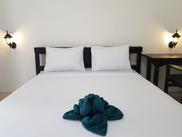 Imagen de la habitación del Hotel Talent Resort. Foto 18