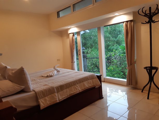 Imagen de la habitación del Hotel Talita Bukit Raya Hotel. Foto 14