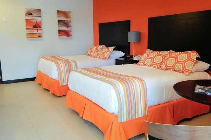 Imagen de la habitación del Hotel Talk Of The Town and Beach Club. Foto 3