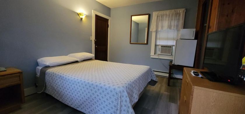 Imagen de la habitación del Hotel Tallwood Motel Wells. Foto 3