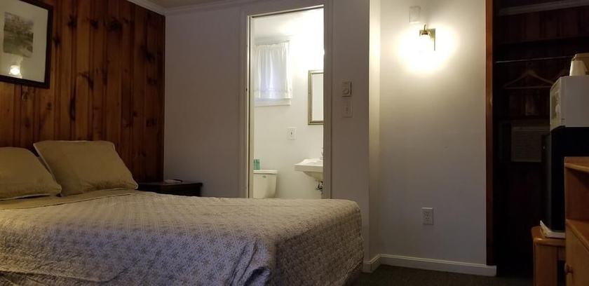 Imagen de la habitación del Hotel Tallwood Motel Wells. Foto 4