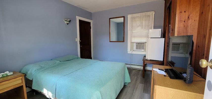 Imagen de la habitación del Hotel Tallwood Motel Wells. Foto 5