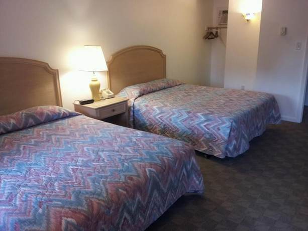 Imagen de la habitación del Hotel Tallwood Motel Wells. Foto 7