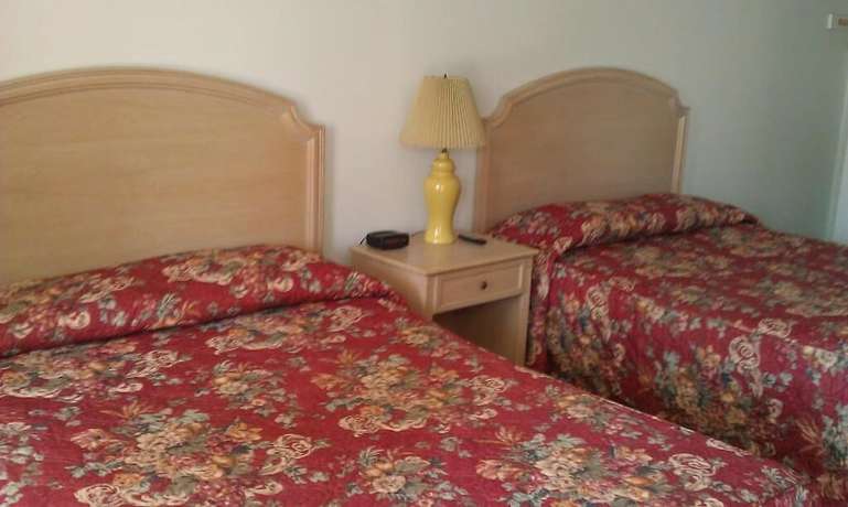 Imagen de la habitación del Hotel Tallwood Motel Wells. Foto 11