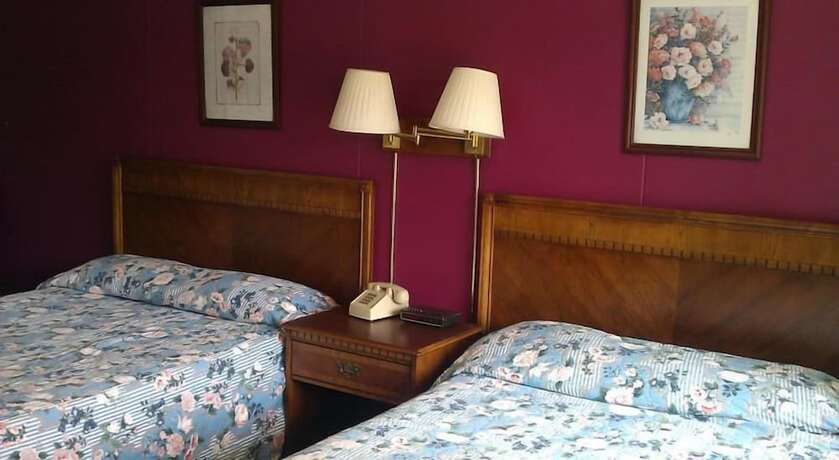 Imagen de la habitación del Hotel Tallwood Motel Wells. Foto 12