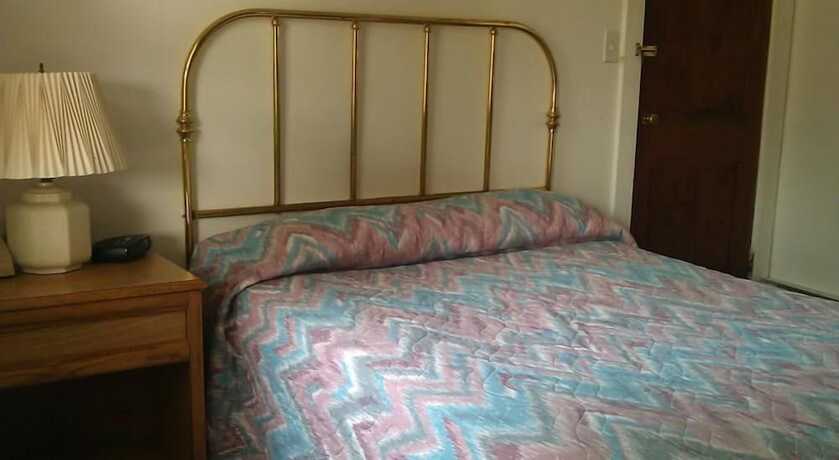 Imagen de la habitación del Hotel Tallwood Motel Wells. Foto 13