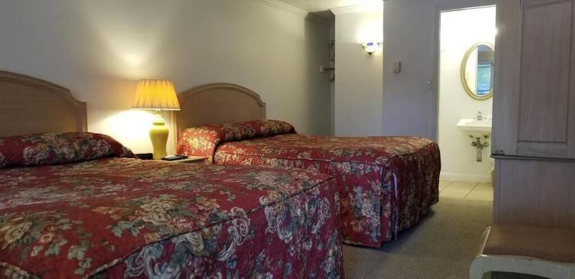 Imagen de la habitación del Hotel Tallwood Motel Wells. Foto 14