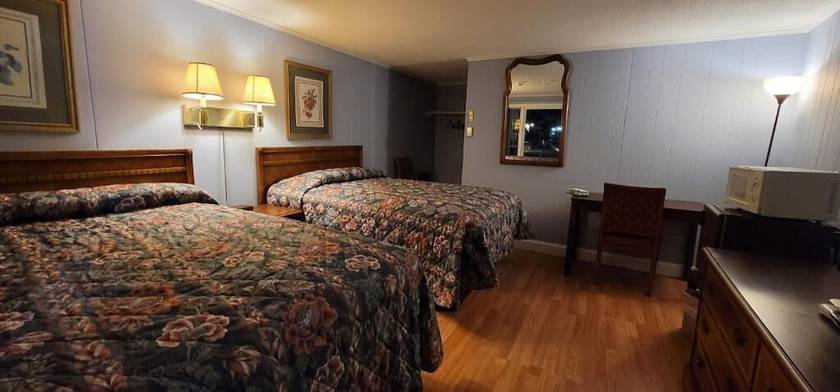 Imagen de la habitación del Hotel Tallwood Motel Wells. Foto 18