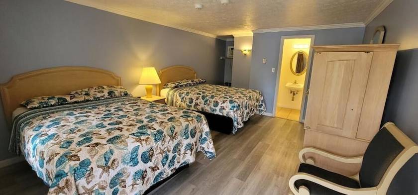 Imagen de la habitación del Hotel Tallwood Motel Wells. Foto 19