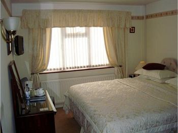 Imagen de la habitación del Hotel Tally Ho Bed And Breakfast. Foto 5