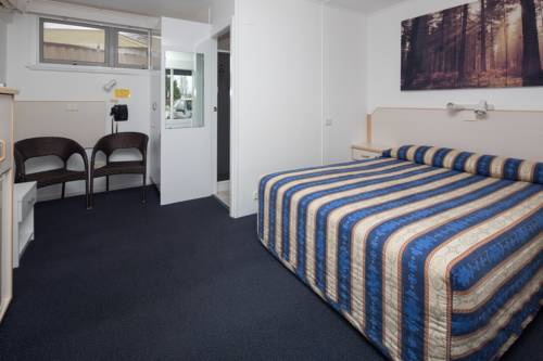 Imagen de la habitación del Hotel Tally Ho Motor Inn. Foto 2