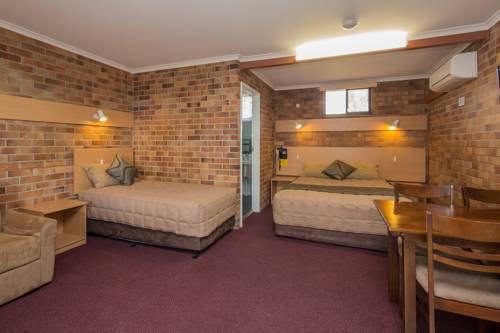 Imagen de la habitación del Hotel Tally Ho Motor Inn. Foto 3