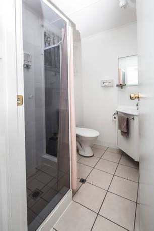 Imagen de la habitación del Hotel Tally Ho Motor Inn. Foto 4