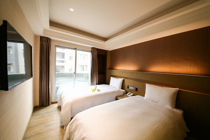 Imagen de la habitación del Hotel Talmud Tainan. Foto 11