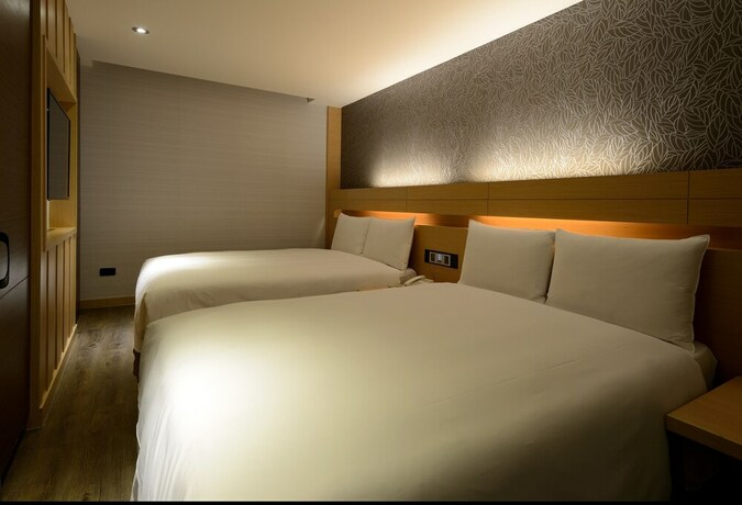 Imagen de la habitación del Hotel Talmud Tainan. Foto 18