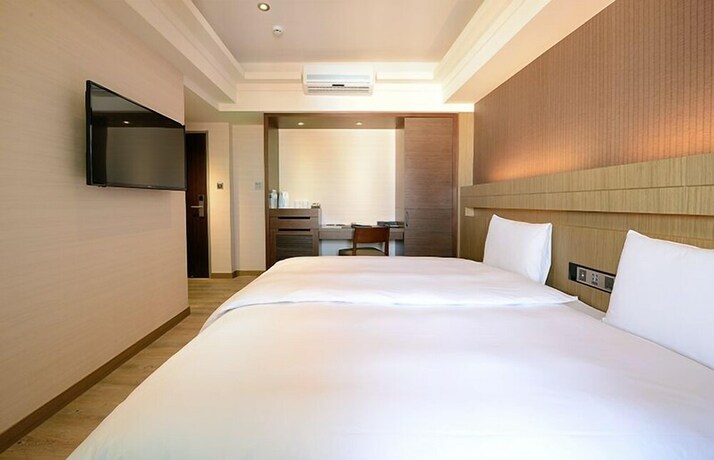 Imagen de la habitación del Hotel Talmud Tainan. Foto 22