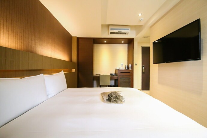 Imagen de la habitación del Hotel Talmud Tainan. Foto 23