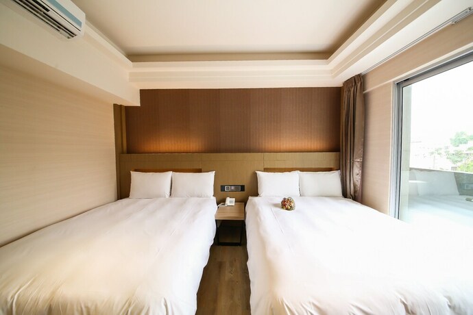 Imagen de la habitación del Hotel Talmud Tainan. Foto 27