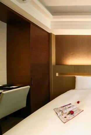 Imagen de la habitación del Hotel Talmud Tainan. Foto 28