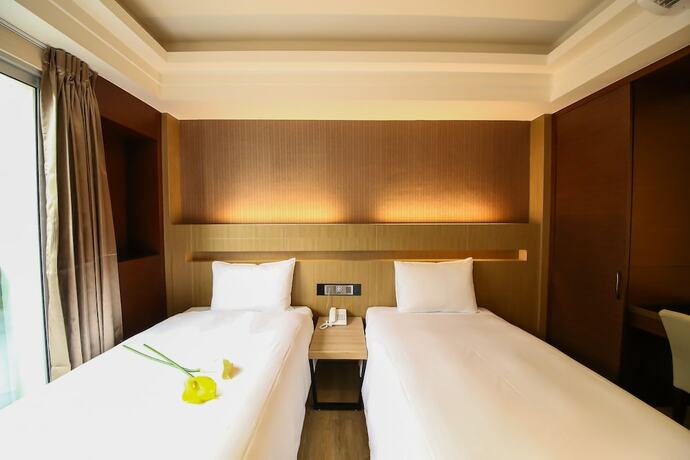Imagen de la habitación del Hotel Talmud Tainan. Foto 32