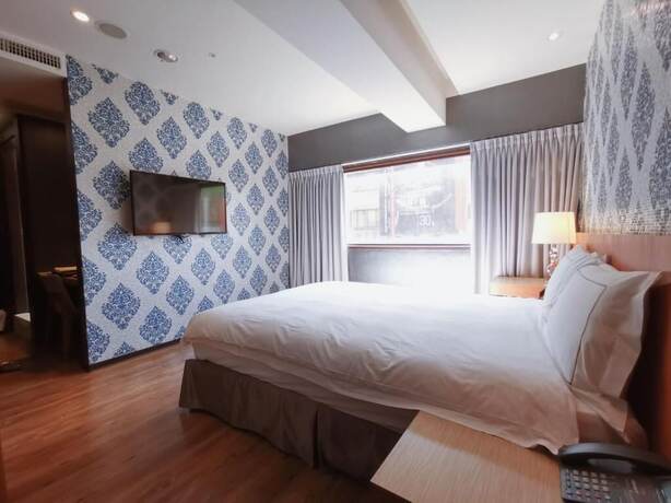 Imagen de la habitación del Hotel Talmud Yizhong. Foto 18