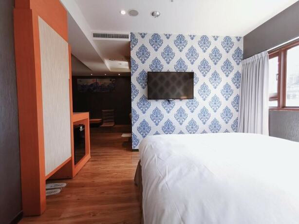 Imagen de la habitación del Hotel Talmud Yizhong. Foto 23