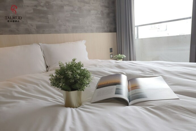 Imagen de la habitación del Hotel Talmud Yizhong. Foto 38