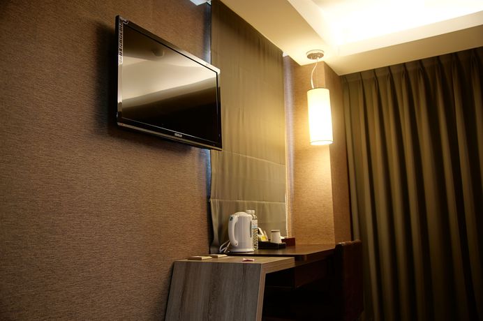 Imagen de la habitación del Hotel Talmud-zhong Shan Branch. Foto 10