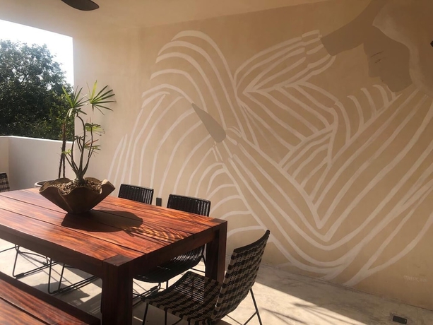 Imagen de la habitación del Hotel Talulah Living. Foto 10
