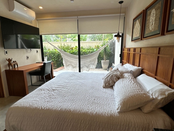 Imagen de la habitación del Hotel Talulah Living. Foto 12