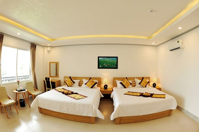 Imagen de la habitación del Hotel Tam Chau Luxury. Foto 18