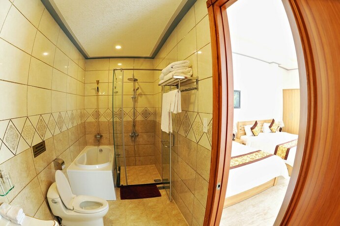 Imagen de la habitación del Hotel Tam Chau Luxury. Foto 26