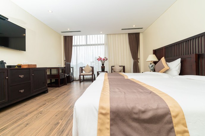 Imagen de la habitación del Hotel Tam Chuc Complex. Foto 4