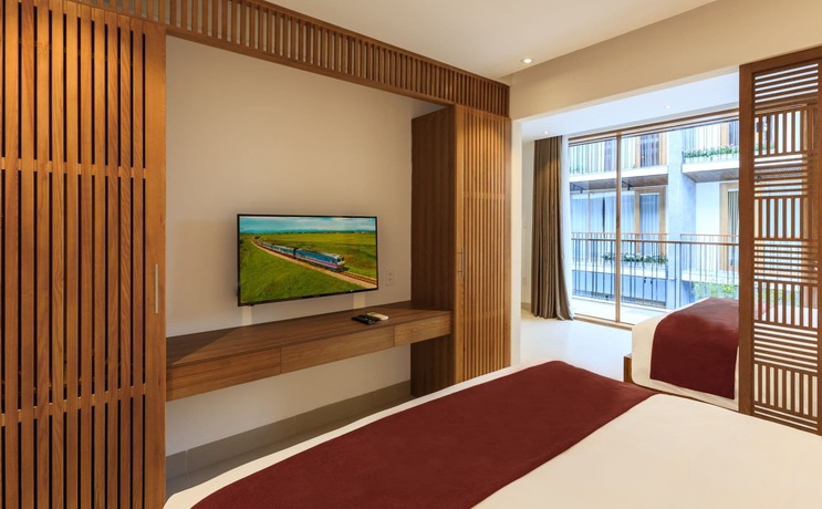 Imagen de la habitación del Hotel Tam House Villa. Foto 6