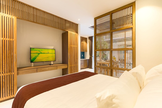 Imagen de la habitación del Hotel Tam House Villa. Foto 9