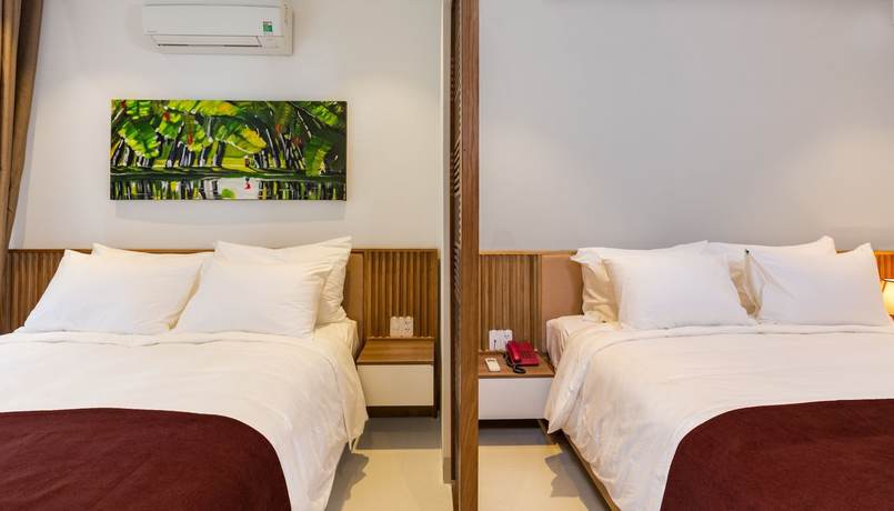 Imagen de la habitación del Hotel Tam House Villa. Foto 10