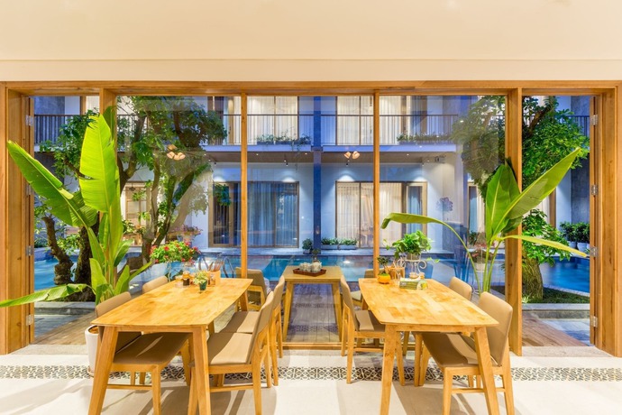 Imagen del bar/restaurante del Hotel Tam House Villa. Foto 4