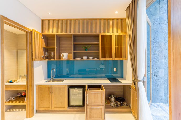 Imagen de la habitación del Hotel Tam House Villa. Foto 16