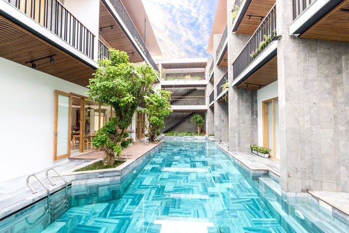 Imagen de la piscina del Hotel Tam House Villa. Foto 20