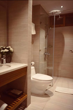 Imagen de la habitación del Hotel Tam House Villa. Foto 18