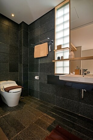 Imagen de la habitación del Hotel Tama Boutique. Foto 16