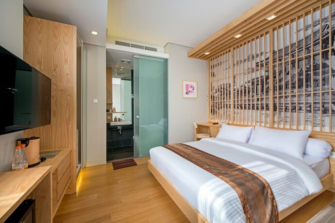 Imagen de la habitación del Hotel Tama Boutique. Foto 18