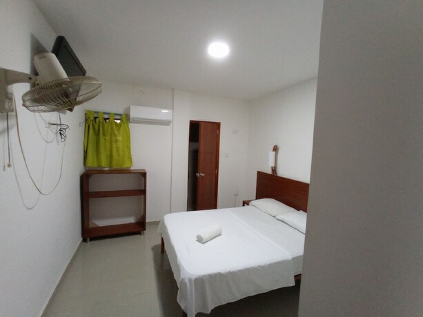 Imagen de la habitación del Hotel Tamaca Real. Foto 18