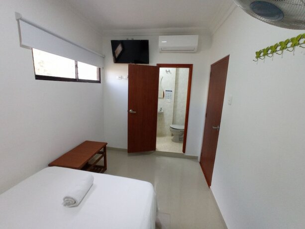 Imagen de la habitación del Hotel Tamaca Real. Foto 19