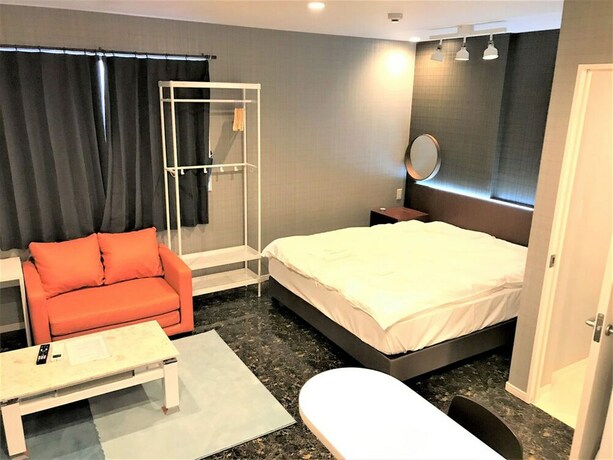 Imagen de la habitación del Hotel Tamade Sakura House. Foto 15