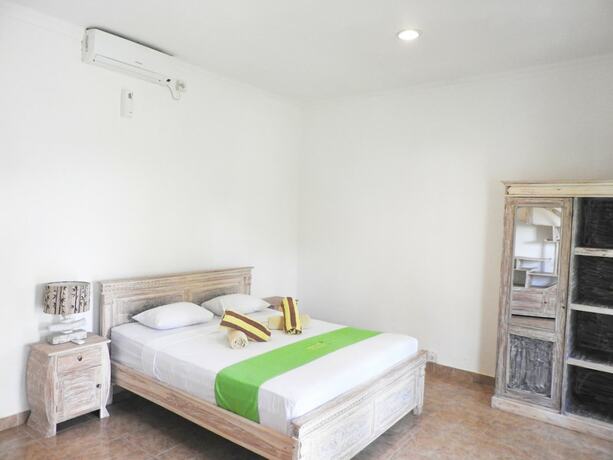 Imagen de la habitación del Hotel Taman Asih Bingin Homestay. Foto 17